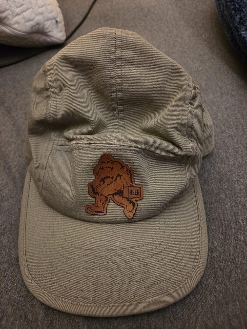 The Classic tan canvas cap with brown beer patch
